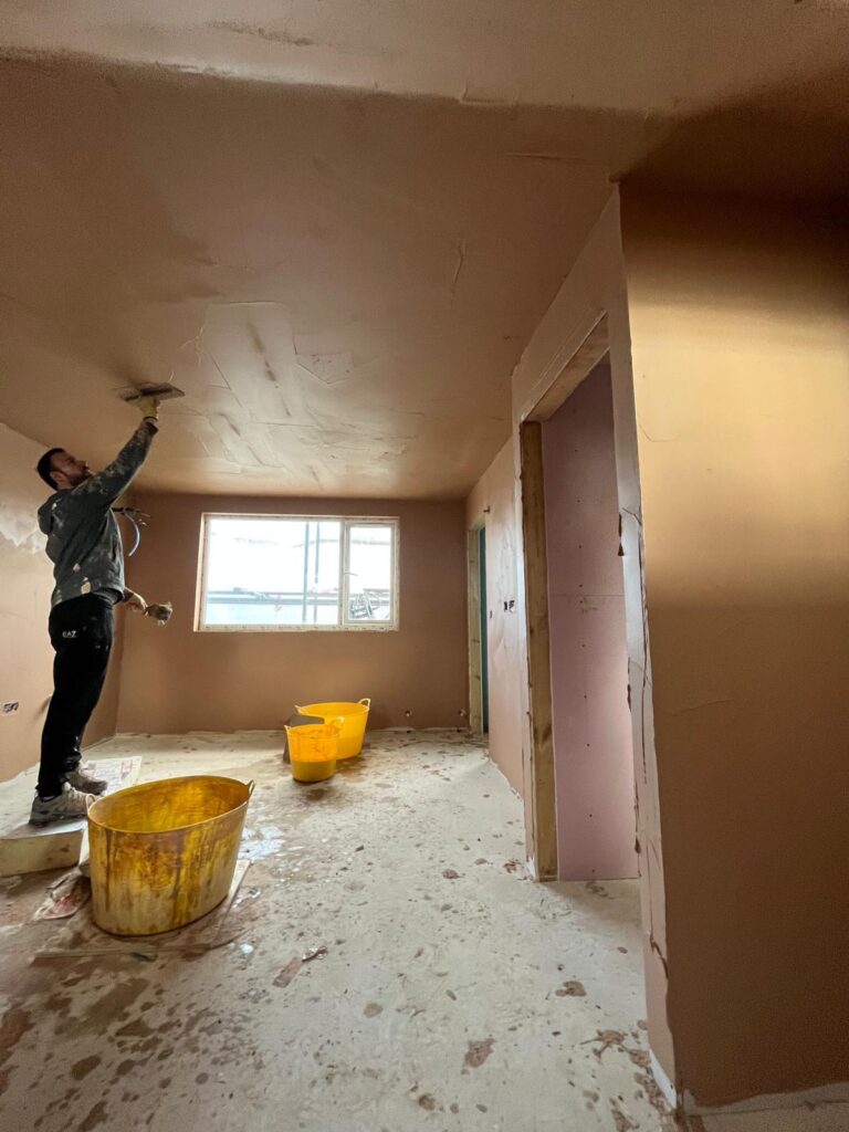 Ilford loft conversion plastering in progress